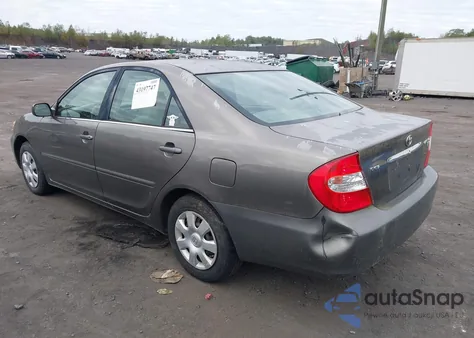 2002 Toyota Camry Le from USA, damaged, VIN 4T1BE32K42U515374
